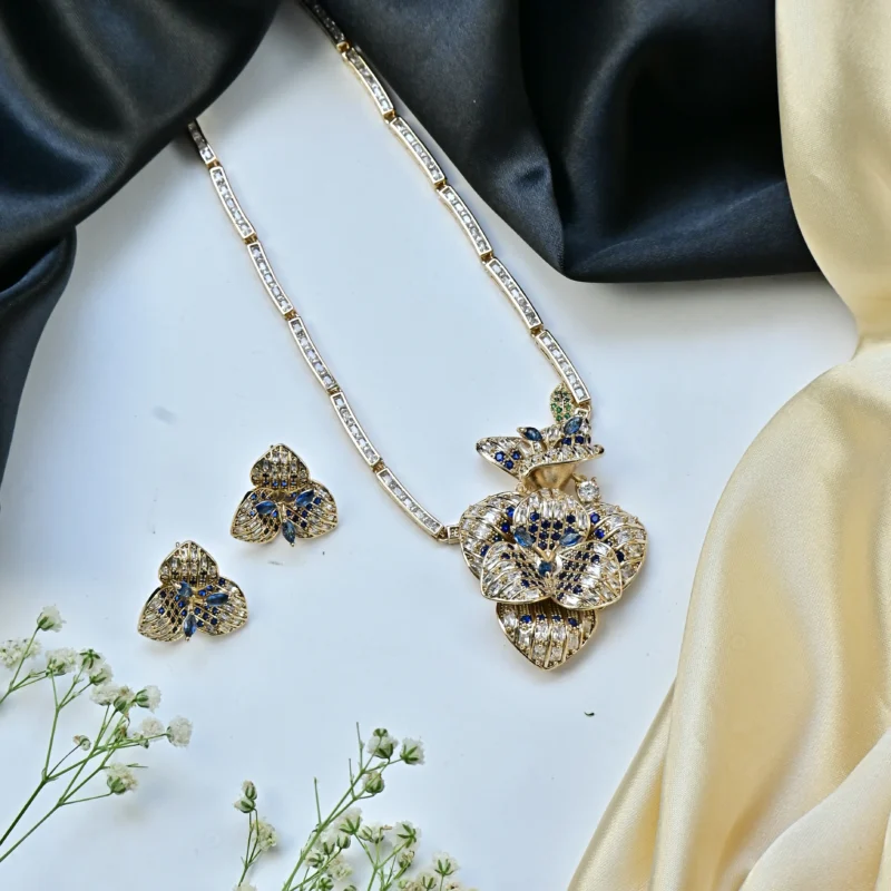 Blue Sapphire and Diamond Flower Necklace with Butterfly Pendant - Image 2