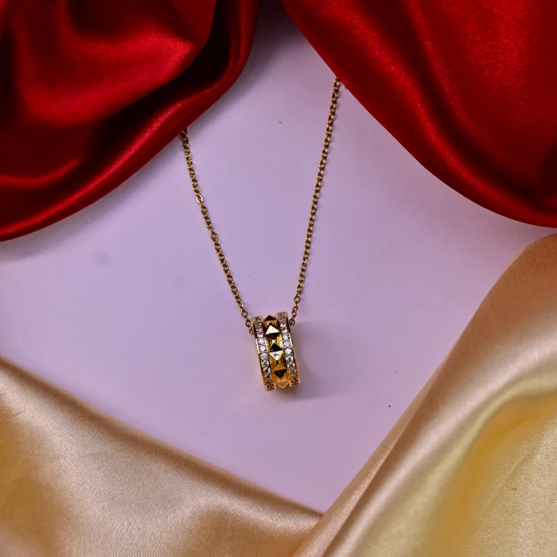 Gold Dual-Ring Pendant with Pyramid Studs and Crystal Borders - Image 4