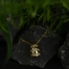 Gold Striped Egg Pendant with Crystal Embellishments